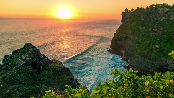 Sunset In The Indian Ocean On The Background Of The Temple Of Uluwatu. 15 July 2015, Bali