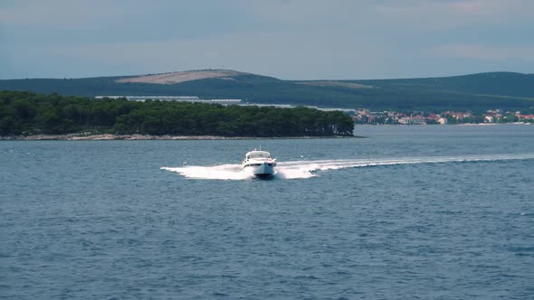 Fashion shooting on motor boat. Aerial view of luxury yacht with top models sailing on rivert. Fashi