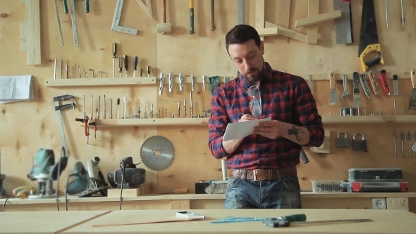 Carpenter In The Carpentry Workshop