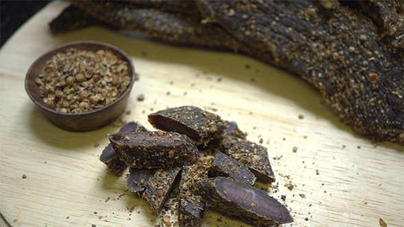 Biltong South African Beef Jerky On a Cutting Board
