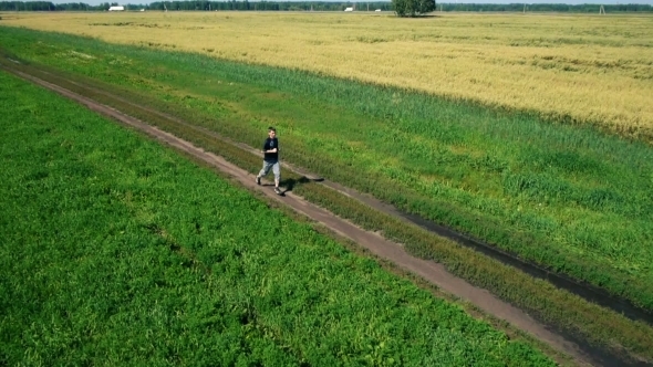 AERIAL: Running Athlete Man. Male Runner Jogging Outdoor. Sport.