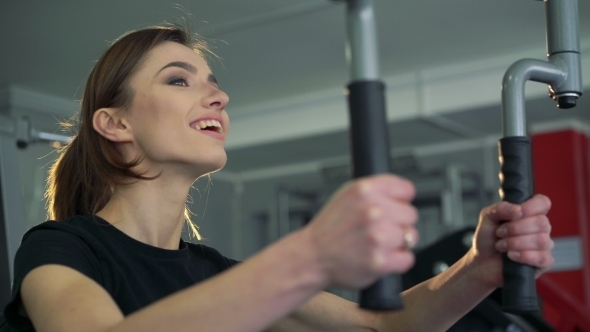 The Girl At The Gym On a Simulator