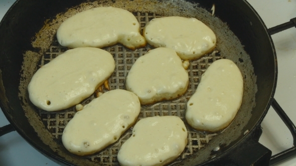 Fried Pancakes In a Frying Pan