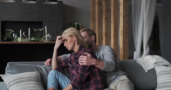 Upset Woman Stress Depression with Solitude Having Problem at Work or Business Sitting on Couch