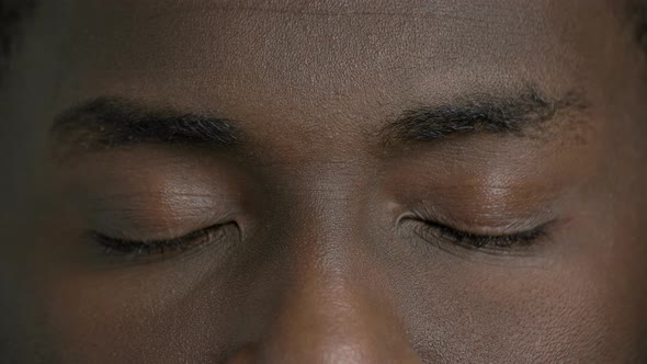Afro-american Man Closed Eyes Close Up.