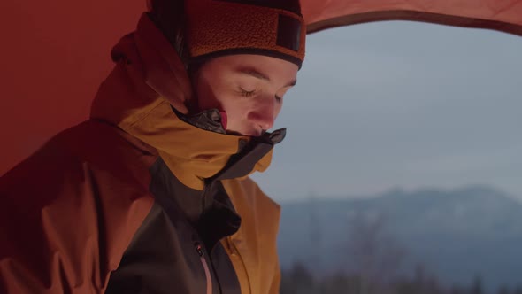 Woman Using Laptop in Camping Tent in Winter