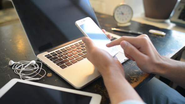 Typing on Smartphone in Office, Networking Online alt