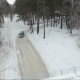 Flying Over The Car In The Woods. Car Under The Bridge. Winter Forest Road - VideoHive Item for Sale