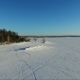 Flying Over The Frozen Sea. Forest On The Banks. Flying Along The Shore - VideoHive Item for Sale