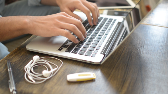 Hands Typing on Laptop for Work in Office, Casual Man alt