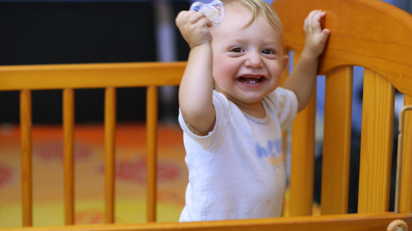 Cute Baby Laughing and Showing his First Teeth