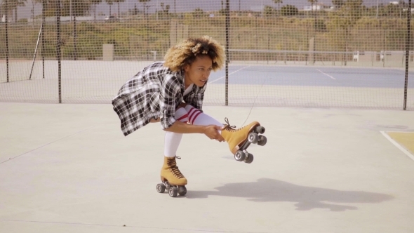 Roller Skater Balancing On One Leg