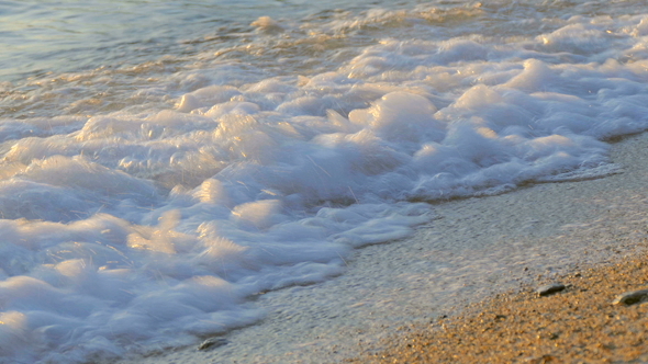 Waves Crushes in the Sand