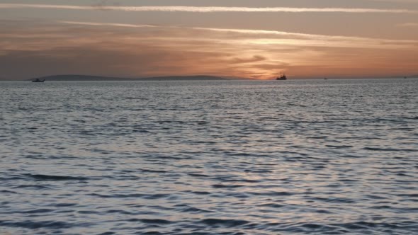 Sunset With Trawler's Silhouette