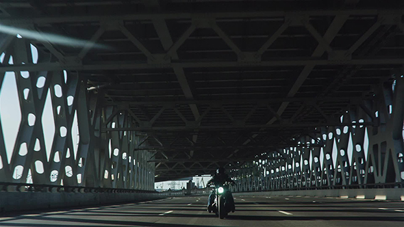 Motorcycle On The City Bridge