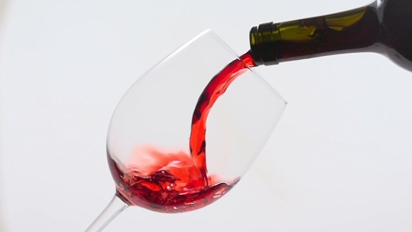 Pouring Red Wine Into a Glass