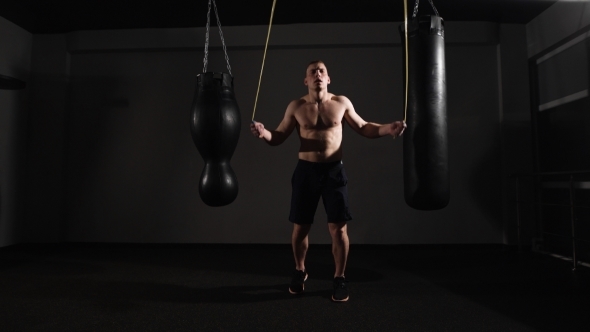 Young Boxer Training With a Skipping Rope