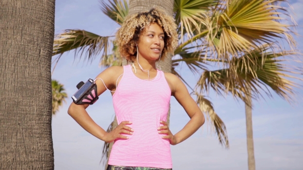 Confident Fit Woman With Arm Band Music Player