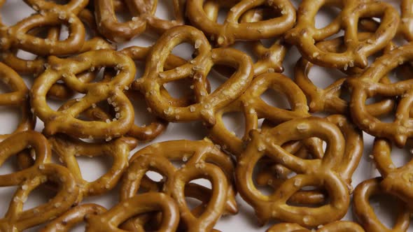 Rotating shot of Pretzels on a white plate 