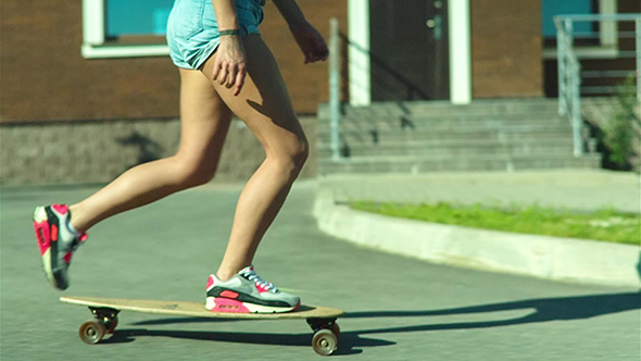 Speeding Skateboarding Woman At City