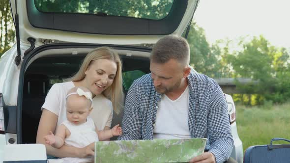 Happy Family Traveling By Car