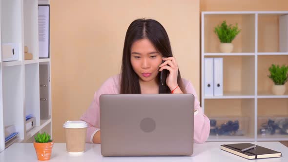 Busy Female Worker in the Office