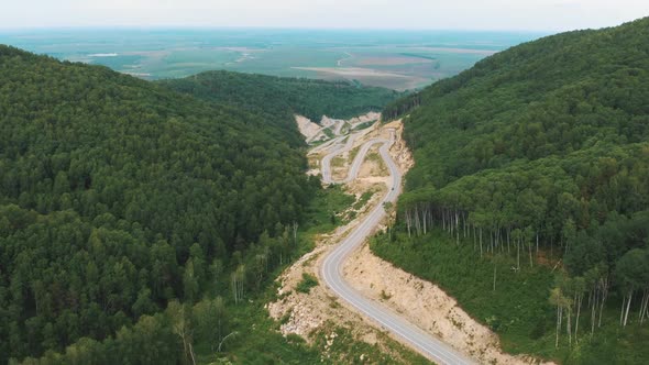 Aerial  Drone Video of Top Vew of Winding Road in the Mountains