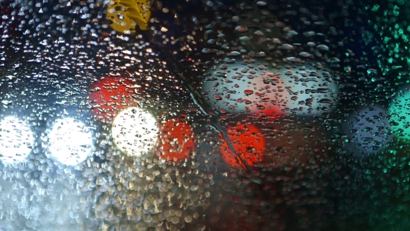 Colorful Commuter Lights In The Rain