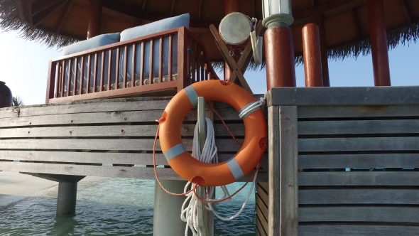 Beach Patio Or Terrace With Lifebuoy In Sea Water 3