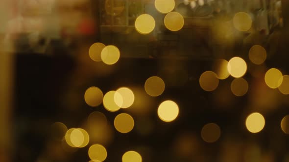 Shimmering abstract colored circles defocused christmas lights video. Blurred fairy lights. 