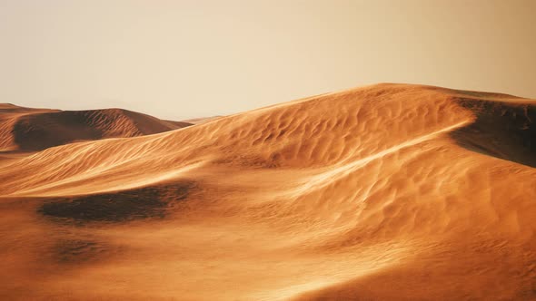 Beautiful Sunset Over Sand Dunes of Sahara Desert in Morocco