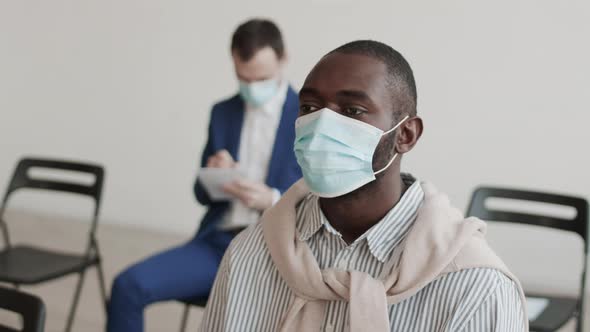 African Man in Face Mask Nodding