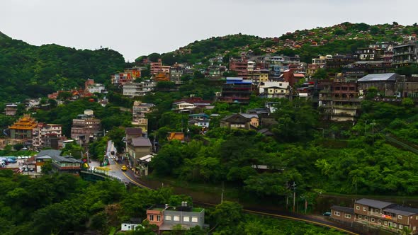 time lapse of Jiufen village with mountain in raining day, Taiwan