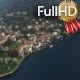 Flying Over a Small Town With a Church on Lake - VideoHive Item for Sale