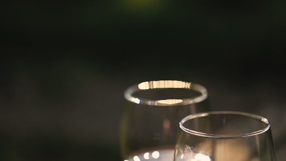 Two Glasses Of Red Wine On a Wooden Table.