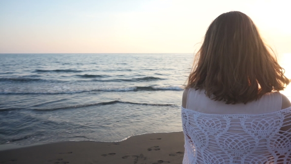 Beautiful Young Woman Running On The Beach 