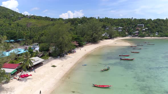 Tropical Beach With Boats