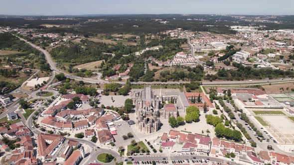 Batalha Monastery and surrounding town, Leiria, Portugal.  Panoramic aerial forward view