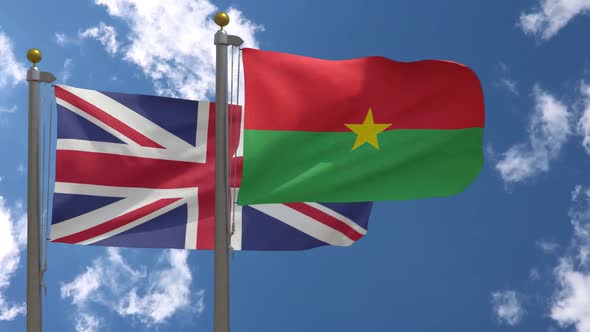 United Kingdom Flag Vs Burkina Faso Flag On Flagpole