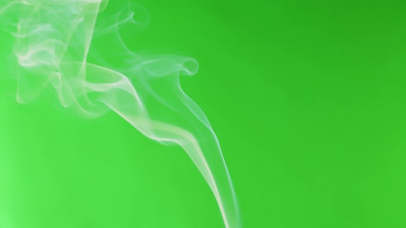 Smoke Jet on Green Chroma Key Background alt