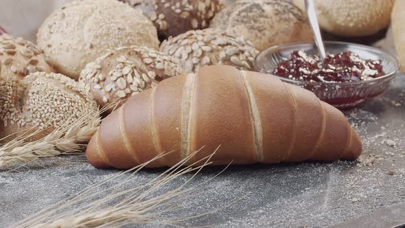 Closeup of Different Types of Fresh Baked Dutch Bread is on the Wooden Table
