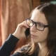 Girl With Glasses Talking On The Phone While  - VideoHive Item for Sale