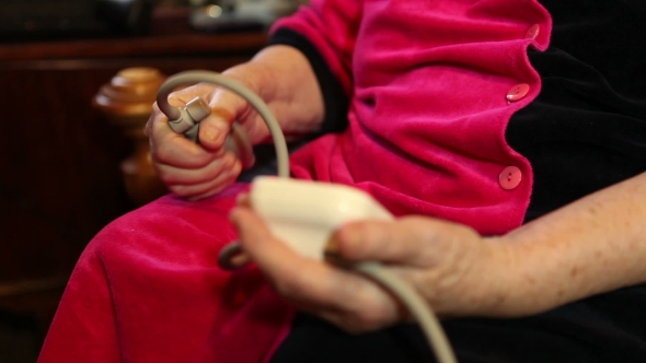 Elderly Woman Measuring Blood Pressure 