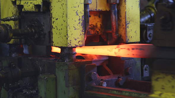 Heavy Industry Machines Forming Melted Burning Hot Iron