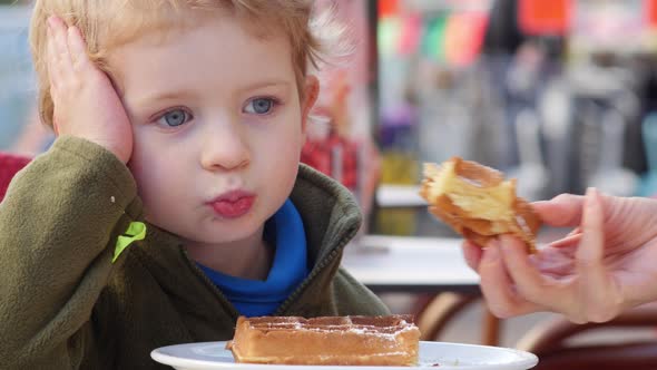 Young Boy Has No Appetite For Waffles.