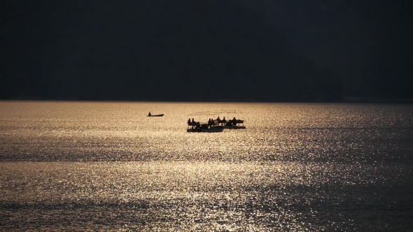 Two Catamaran At Sunset