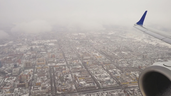 View From The Descending Aircraft On Clouds