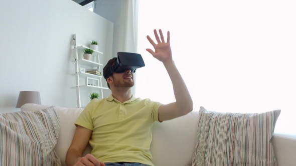 Man In Virtual Reality Headset Playing Game