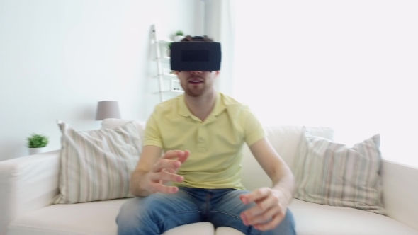 Man In Virtual Reality Headset Playing Game