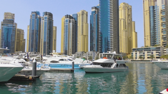 Yacht Moored In City Harbor